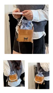 Summer trendy bucket bag with pearl handle and chain strap, casual chic crossbody bag for women.