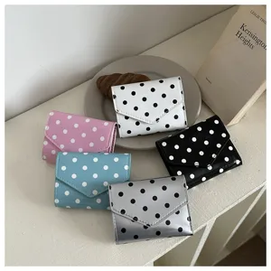 Stylish polka dot tri-fold wallet for women, compact PU leather card holder coin purse in multiple colors.