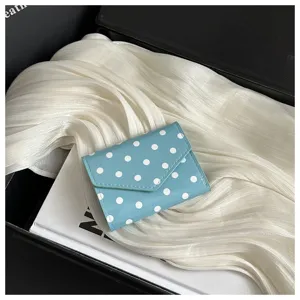 Chic blue polka dot small wallet, glossy leather tri-fold card holder for women daily use.