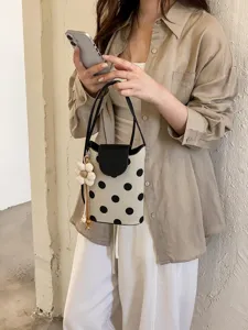 Sac bandoulière à pois chic et coloré, élégant sac à main de vacances d'été pour femmes.