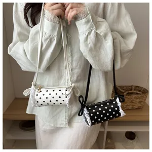 Borsa a tracolla cilindrica a pois in pizzo, design carino con delicati dettagli in pizzo.