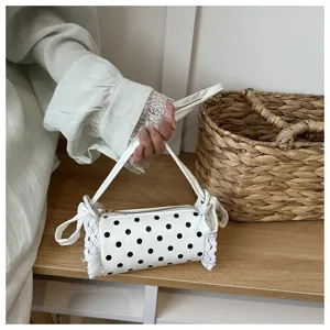 Borsa a mano a pois in pizzo per ragazze dettaglio borsa a spalla cilindrica carina.