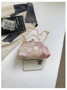 Borsa da sera chic ricamata in paillettes con chiusura in metallo e catena donna.