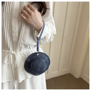 Denim fisherman hat shaped mini coin purse detail view, creative portable earphone storage bag.