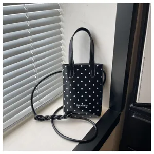 Pequeño bolso de mano negro y blanco con lunares, bolso bandolera minimalista para mujer.