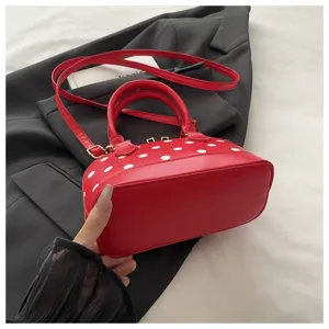 Red polka dot shell handbag for women, stylish minimalist crossbody shoulder bag for summer.