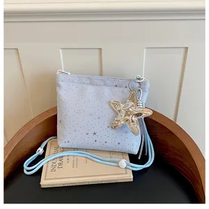 Light blue star pattern crossbody bag with large star charm, trendy daily shoulder bag.