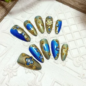 Uñas postizas hechas a mano 10pcs juego ojo de gato azul almendra estilo barroco de lujo