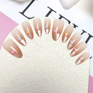Handmade press-on cat-eye false nails with cute heart design, stylish and easy to wear.