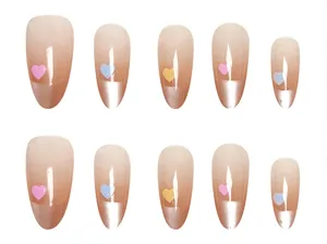Handmade press-on nails with cat eye gradient and cute heart charms for stylish everyday wear.