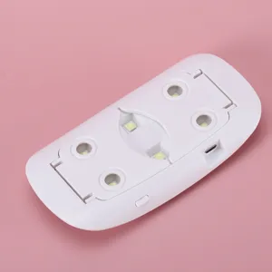 Mini lámpara de uñas UV LED portátil con soporte plegable y puerto USB para manicure.