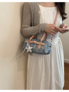 Denim small crossbody bag with pink straps and star charm, vintage style handbag for women.