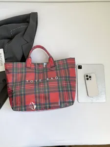 Red green plaid tote bag detail shot waterproof canvas handbag casual shoulder daily commuting bag