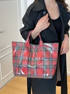 Large capacity plaid tote bag for women, waterproof PVC commuting handbag, stylish casual design.