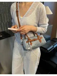 Vintage denim handbag for women, casual crossbody shoulder bag with stylish star pendant.