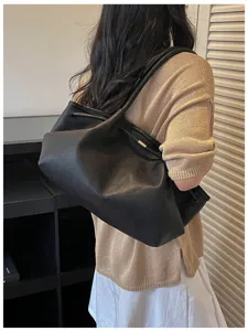 Minimalist black hobo shoulder bag, large capacity daily underarm handbag for women.
