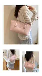 Detailed view of the stylish pink minimalist tote shoulder bag, showcasing premium texture.