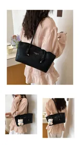 Classic black tote bag for women, large capacity shoulder bag for daily commuting and office use.