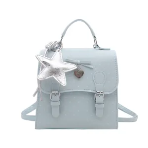 Cute light blue polka dot mini backpack with silver star pendant casual daypack for women
