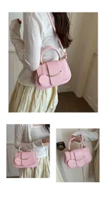 Roze leren schoudertas voor dames, stijlvolle crossbody tas met metalen stang detail.