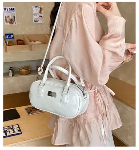 Sac à bandoulière cylindrique élégant en cuir verni blanc pour femme style décontracté d'été