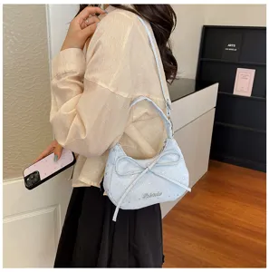 Chic light blue bow hobo shoulder bag for women, stylish dumpling crossbody bag with stars.