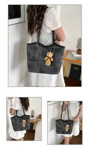 Stylish women shoulder tote bag with cute bear pendant, dark grey patterned casual commuter bag.