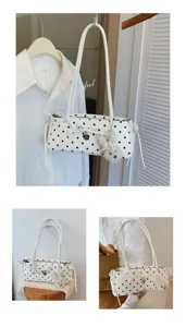 Stylish white polka dot shoulder bag with bow and cute puppy plush pendant for daily use.