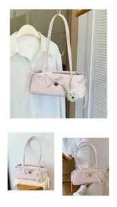Pink polka dot shoulder bag with cute bow and fluffy pendant for women daily commute use.