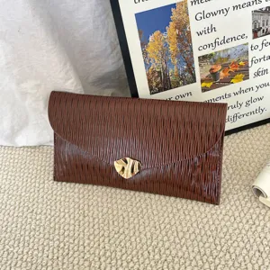 Stylish brown pleated envelope clutch bag for women, elegant commuter design with chic gold clasp.