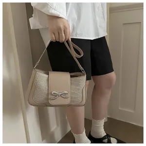 Bolso de hombro baguette elegante con lazo de diamantes y textura de cocodrilo para mujer.