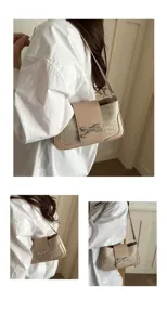Vista detallada del elegante bolso de hombro para mujer con lazo de diamantes y cocodrilo.