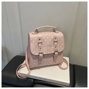 Zaino rétro a pois da donna, stile college casual in ecopelle PU di colore rosa.