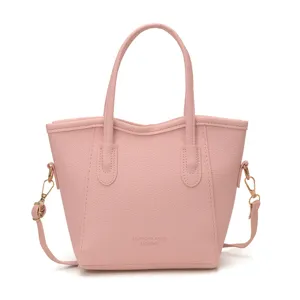 Trendy pink PU leather bucket bag for women, large capacity casual handbag with top handles.