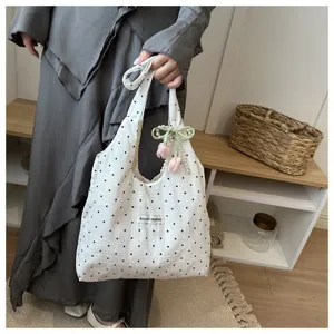 Korean simple polka dot tote bag detail view, fashion casual canvas shoulder bag.