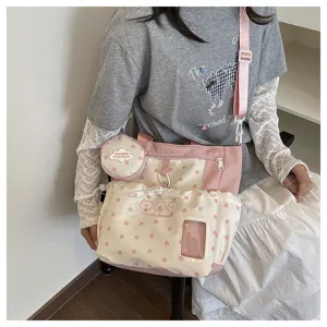 Japanese style cute polka dot canvas backpack for women, lightweight casual school bag with cute pouch.