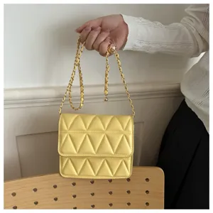 Fashionable yellow quilted crossbody bag for women, trendy chic small square bag with chain.
