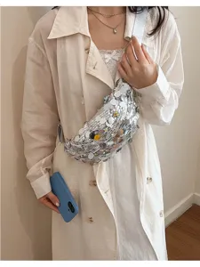 Detail shot of stylish sequin sling bag, summer fashion crossbody phone bag variant.