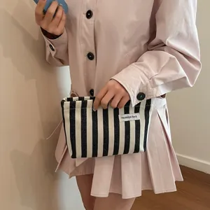 Pochette de maquillage en tissu rayé organisateur de voyage sac à main minimaliste
