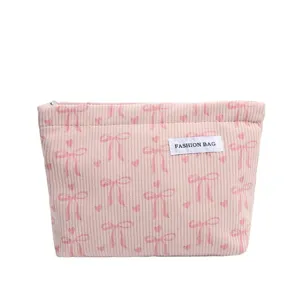 Trousse de maquillage en velours côtelé rose voyage grande capacité nœud mignon pochette portable.