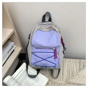Mini casual patchwork backpack detail view, light purple and grey nylon hiking daypack