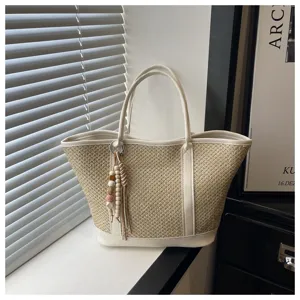 Stylish large capacity straw woven tote bag for women, summer beach shoulder bag with bead pendant.