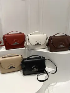 Ensemble de sacs à bandoulière pour femmes avec serrure tournante et poignée.