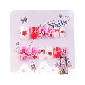 Niedliches Kinder Rosa künstliche Nägel Set mit Herz Bogen Design süße Nagelkunst