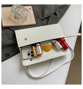 Elegante bolso de hombro de cuero PU blanco para mujer, bolso cruzado de moda con gran capacidad.