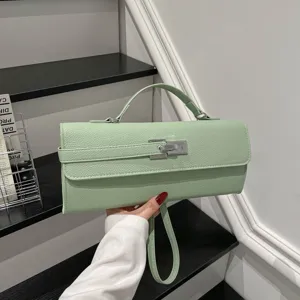 Bolso de mano de cuero verde claro elegante con asa y cierre metálico. Estilo vintage para mujeres.