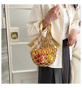 Close-up detail view of stylish leather mesh tote bag, lightweight casual hollow handbag.