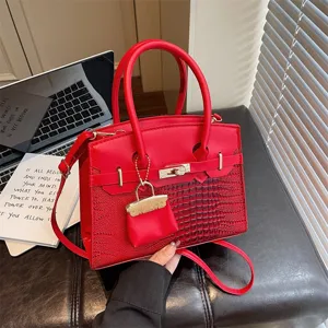Red luxury fashion shoulder bag for women, stylish crocodile pattern leather tote bag.