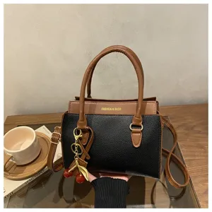 Women stylish contrast color shoulder bag handbag with cherry pendant for daily fashion