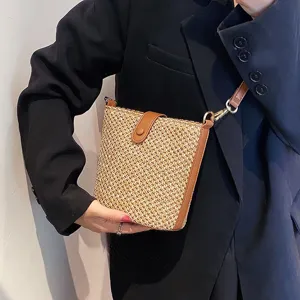 Chic woven straw crossbody bag for women, stylish summer casual bucket bag with leather trim